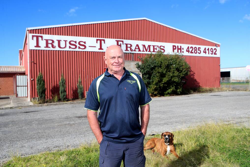 Retirement: Neil Phillips, of Truss-T-Frames Woonona during the last day on the job after more than 40 years in the timber industry. Picture: Sylvia Liber 