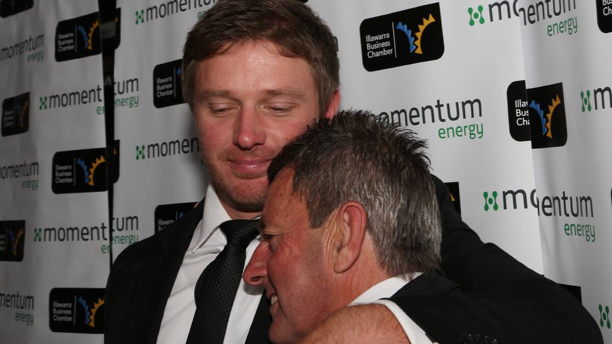 Matt Radnidge is hugged by his very proud dad John Radnidge. Picture: Greg Ellis
