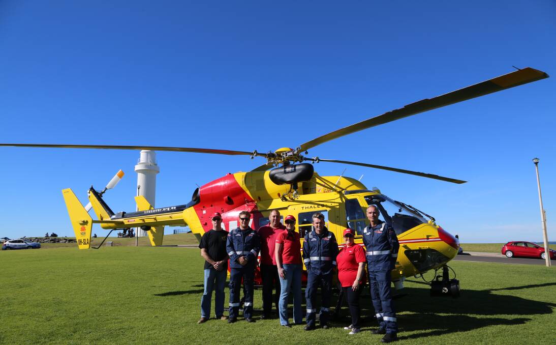 Fundraising: Matt Cooney, Harley Dengate, Scott Murray, Cassie Sleigh, Euan McKenzie, Deanne Collins and Rod Wildman promote the Westpac Lifesaver Rescue Helicopter fundraiser in Wollongong. Picture: Greg Ellis.
