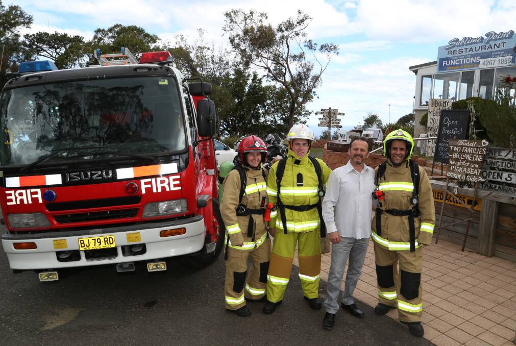 Climbing for a cause: Rachel Hessenberger, of Fire & Rescue NSW, and James Austin, of the Rural Fire Service, Alex Marlos, of Sublime Point Restaurant and Adrian Panozzo of Fire & Rescue NSW. Picture: Greg Ellis. 
