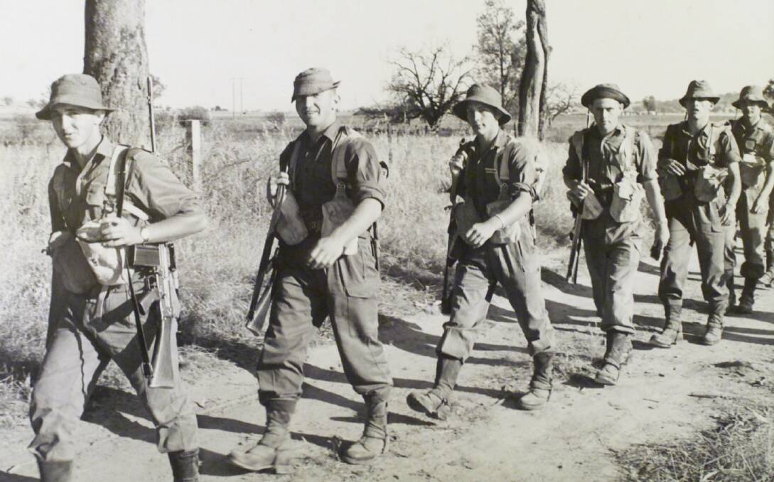 Peter Poulton, second from left, marching with other troops almost 50 years ago. 