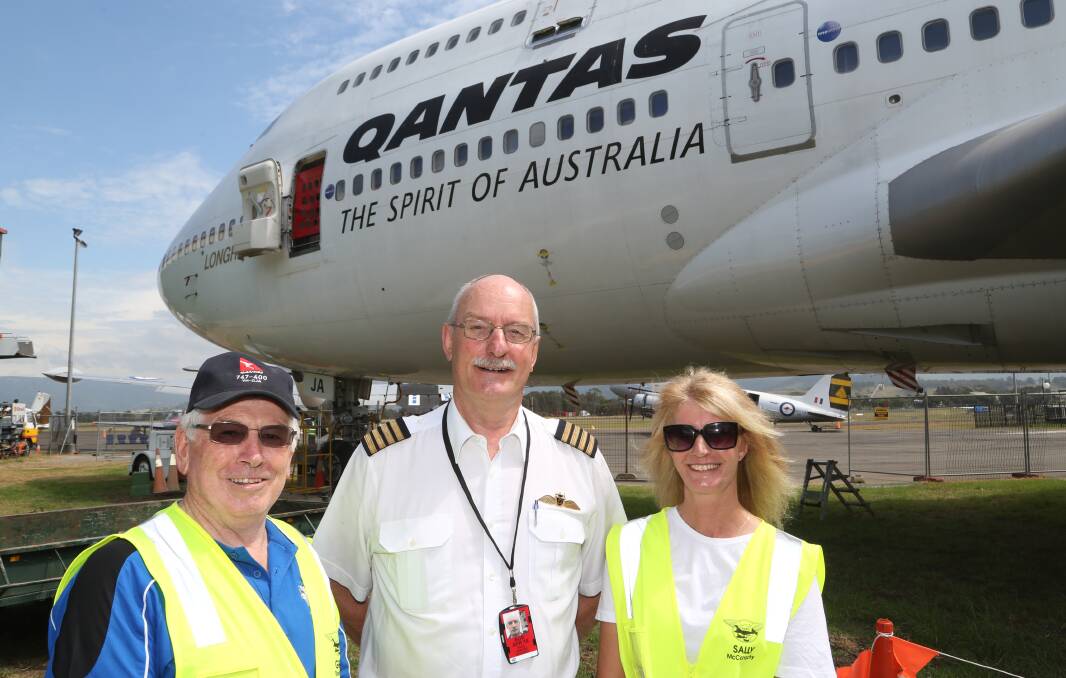 New tour: Former Qantas engineer Greg Stevenson, Captain Sandy Howard and flight attendant Sally McConachy with the popular Jumbo at HARS. Picture: Greg Ellis