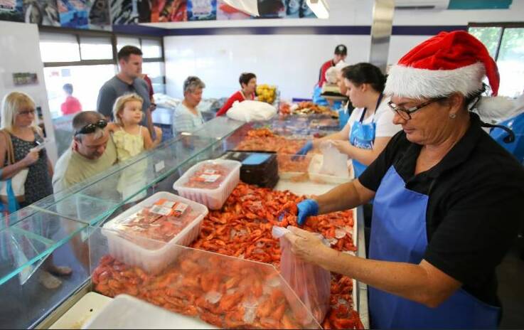 Christmas is the busiest time of the year at Harley and Johns Seafood Fairy Meadow. Picture: Adam Mclean,

