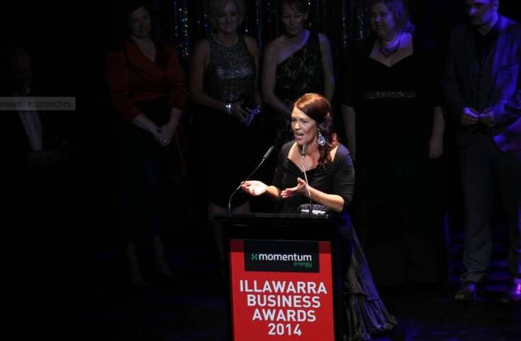 Deb Tozer accepting the Illawarra Business Award for CareSouth in 2014. Picture: Greg Ellis.
