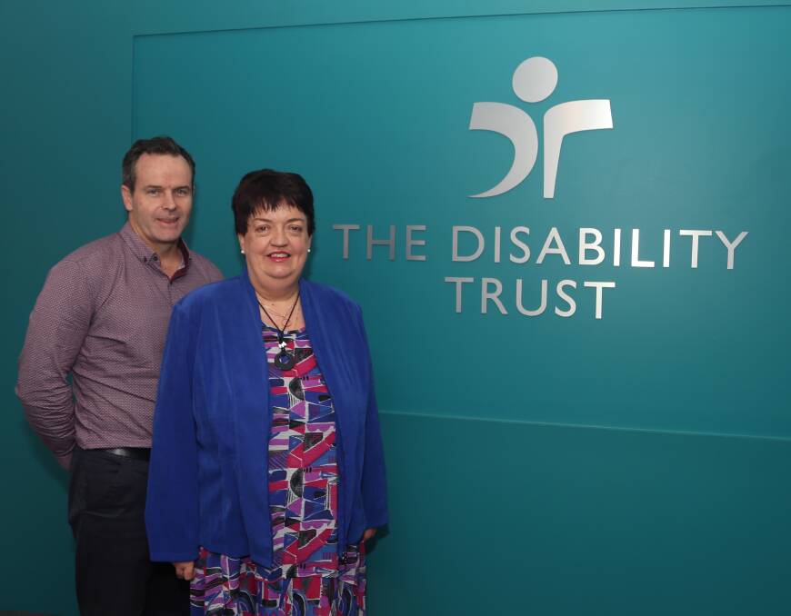 New opportunity: Executive manager Matthew Martin welcomes Margaret Biggs to The Disability Trust. Picture: Greg Ellis.
