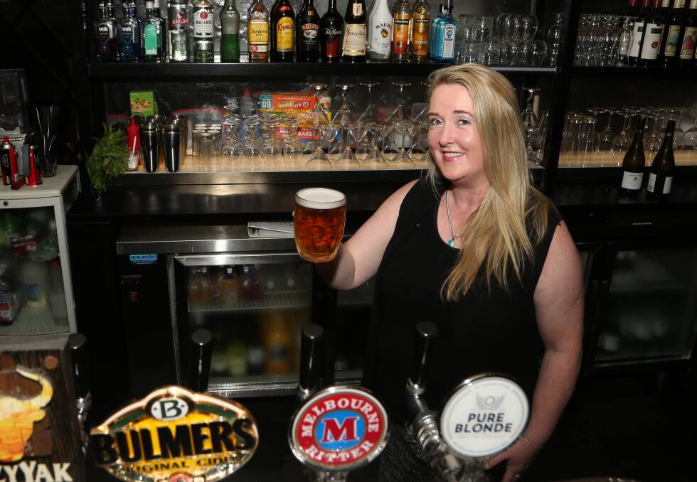 Welcome: Sharon Arrow is preparing to serve up a pint or two to English fans visiting Wollongong for the first Super League game outside Europe. Pic: Greg Ellis.


