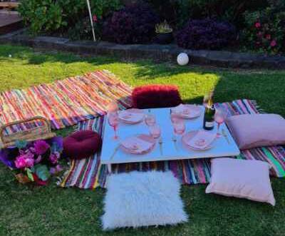The Brassil family set up their Mother's Day picnic in the backyard.
