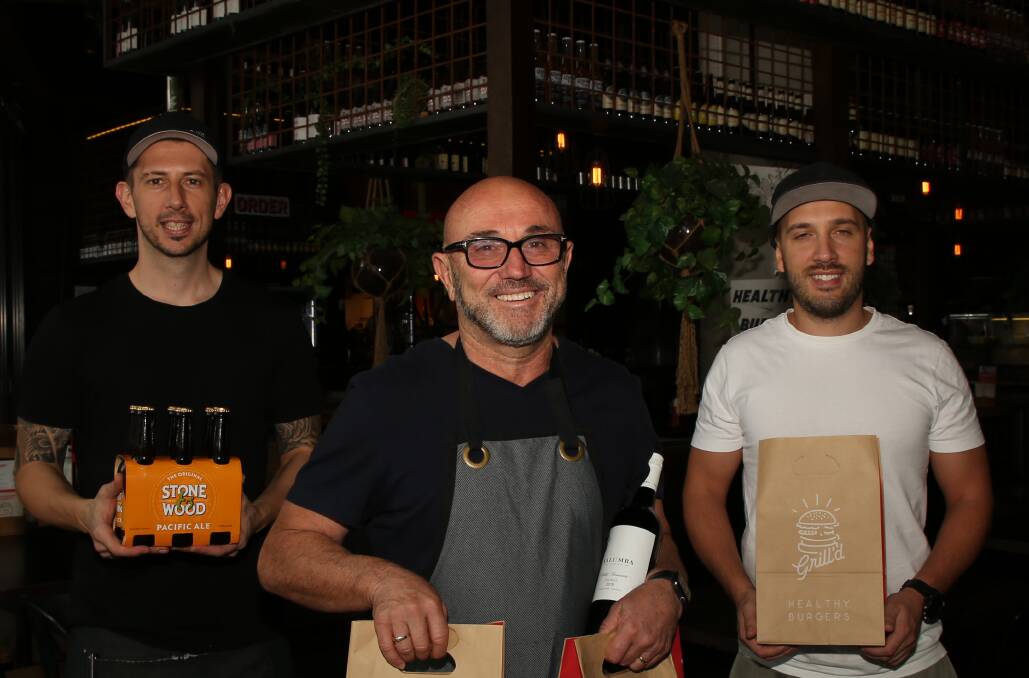 Thanking heroes: Robert Gorgievski, Lube Markovski and Allen Markovski are acknowledging health and emergency workers at Grill'd Wollongong. Picture: Greg Ellis.
