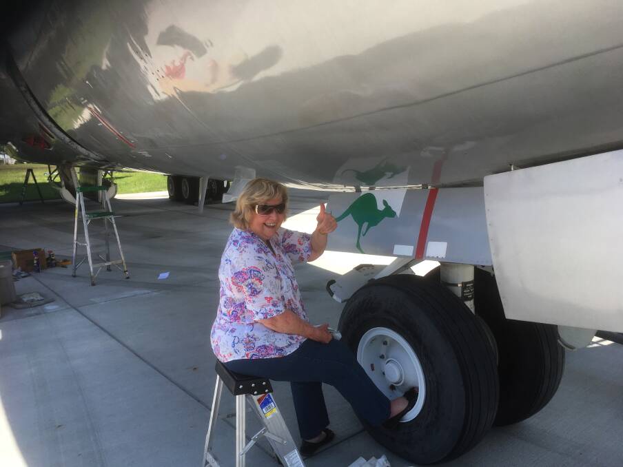 Mission Travolta: Maureen Massey, of HARS, with the Boeing 707 in August. Picture: Bob De La Hunty,