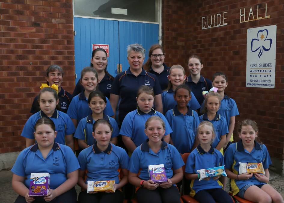 Youth development: NSW Commissioner Sarah Neill with Girl Guides and their leaders at the Fernhill Guide Hall at Fairy Meadow. Picture: Greg Ellis.

