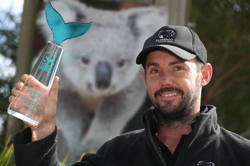 Best international engagement. Symbio Wildlife Park marketing and creative director Kevin Fallon with his international Shorty Award for best overall presence on Facebook. Picture: Robert Peet.