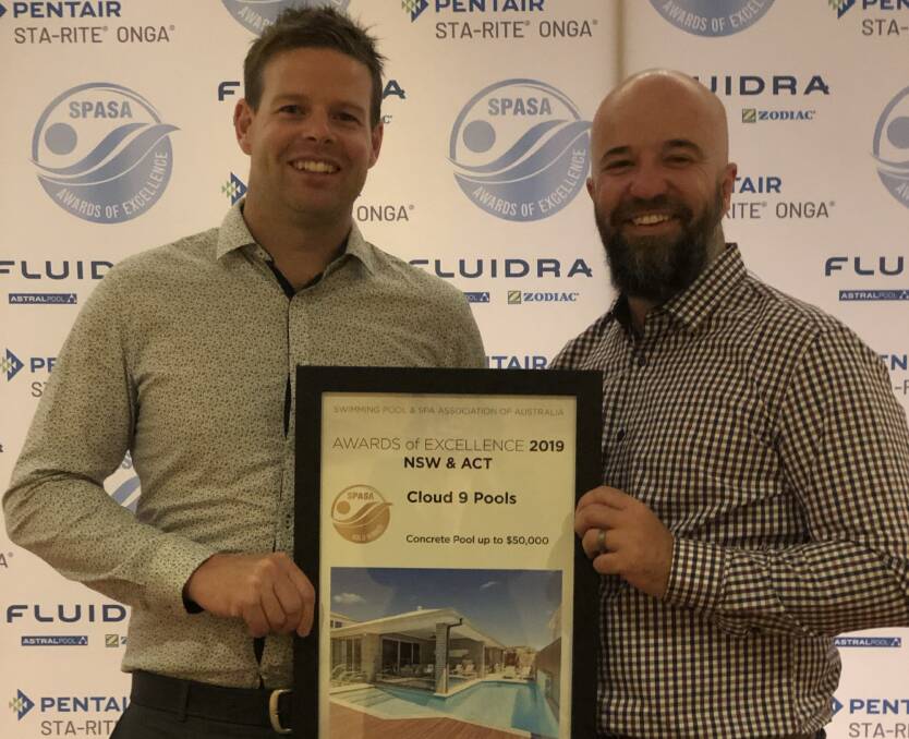 Immediate success: Cloud 9 Pools owners Glenn Heath, of Oak Flats, and Rob Lewis, of Barrack Heights, on Cloud 9 after winning gold at the NSW & ACT SASA Awards.

