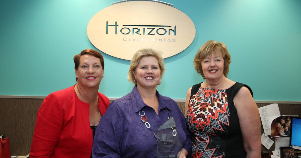 Recognition: Maree Kerr, Kim Morris and Glenda Papac with the award won by Horizon Credit Union for an innovative financial literacy program. Picture: Greg Ellis.