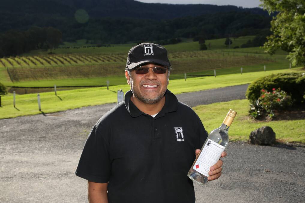 Clean vintage: Rajarshi Ray with a bottle of the 2020 Silos Estate hand sanitiser. Picture: Greg Ellis.
