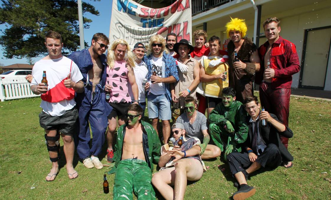 Let's celebrate: The premiership-winning Gerringong Lions lap up the sun at Michael Cronin Oval in their best Mad Monday attire.