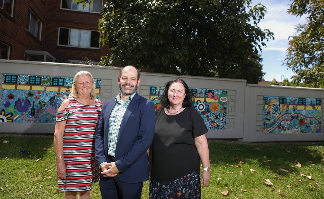 UNVEILING: Warrawong Community Centre's Maxyne Graham, Mission Australia's Brett Fahey and Department of Communities and Justice's. Liz West.