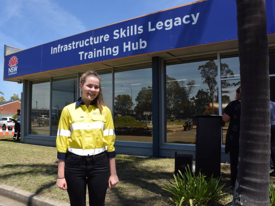 WORK: Safety administrator Mikayla Klusenberg, 18, is employed by Seymour White, the construction group responsible for the Berry to Bomaderry Princes Highway upgrade
