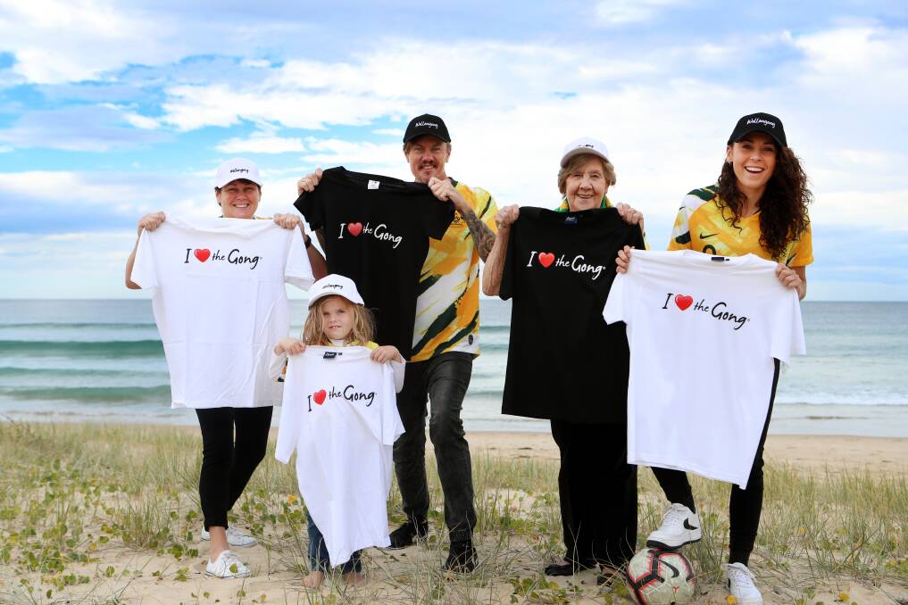WE HEART GONG: Caitlin Foord's family with the t-shirts and hats which will be travelling to France for the World Cup.
