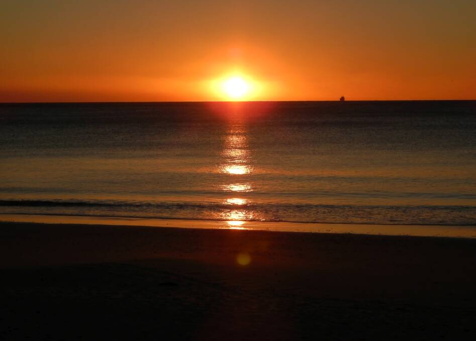 Sunrise: North Wollongong beach by Hans Haverkamp.