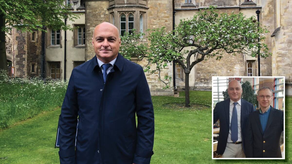 Main image, Professor Alex Frino at Cambridge University this week in front of Sir Isaac Newtowns Tree and his rooms at Trinity College. The tree was grown from a cutting of the original tree where legend has it the 17th century scientist observed an apple falling and then developed his theory on gravity. Inset, Professor Frino (left) with Cambridge University's School of Finance head Professor Bart Lambrecht.