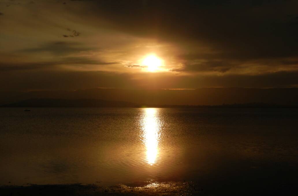 Lake Illawarra sunset by Hans Haverkamp. 