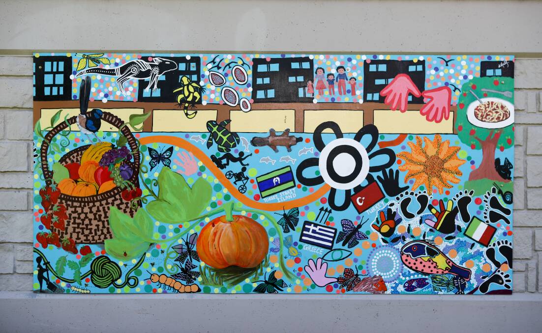 COLOUR: One of the community murals unveiled at the park in Greene St, Warrawong. Picture: Adam McLean.