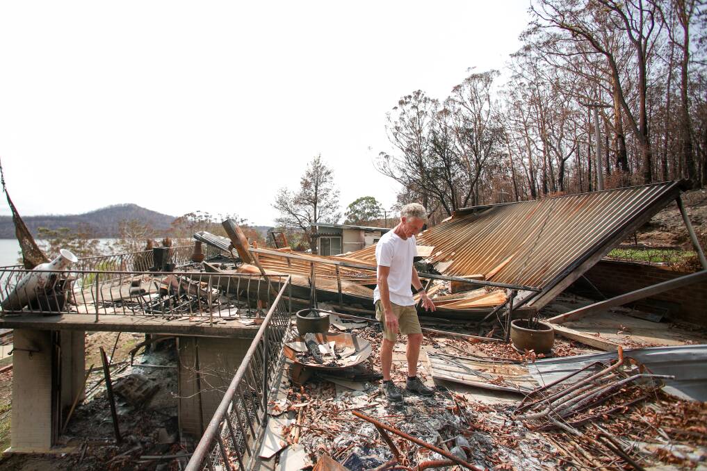 TRAGEDY: Greg Webb at his bushfire affected home on Evans St at Lake Conjola. Photo: Adam McLean.
