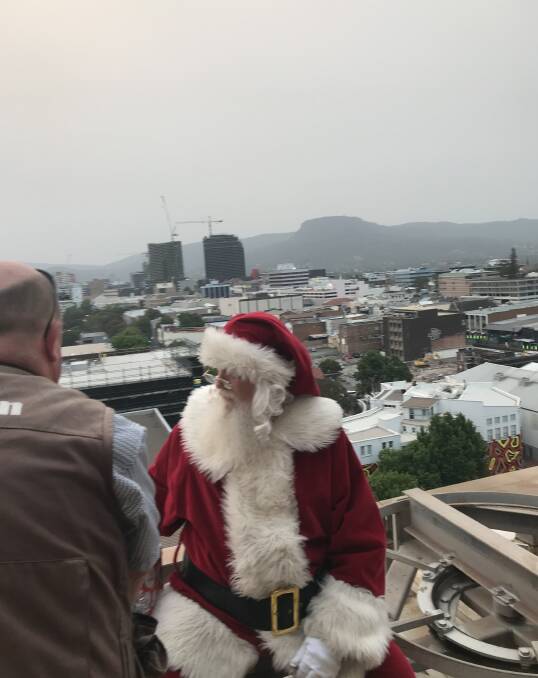 SNEAK LOOK: Santa on top of the Wollongong City Council building for a special message coming soon. 