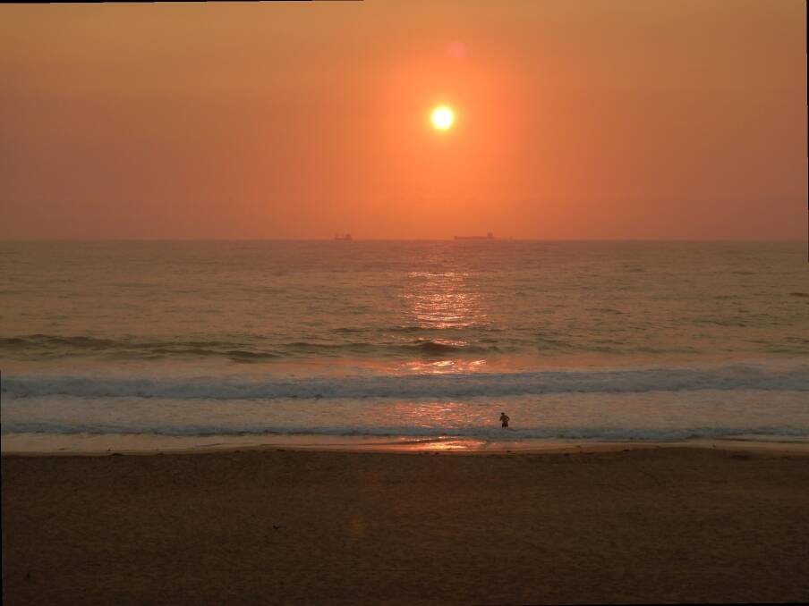 Sunrise swimmer, taken at North Wollongong beach on March 5 by Hans Haverkamp