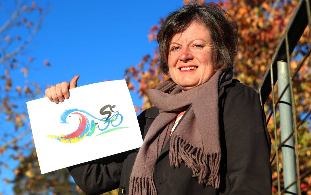 Edwina Grant with her stunning entry in the Take Wollongong to the World Logo Competition. Picture: Sylvia Liber. 