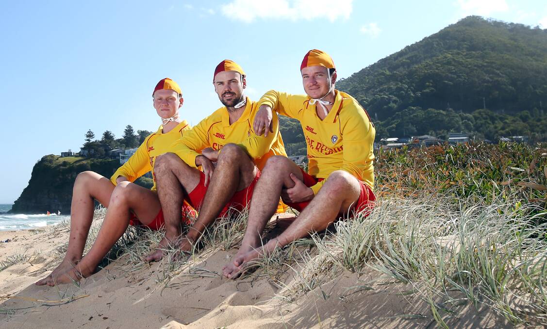 HEROES: Lochleigh Thomson, Ed White and Nick Lowe who helped save a stricken paraglider pilot who went into the ocean at Stanwell Park. The rescue has been named Life Saving NSW’s Rescue of the Month. Picture: Sylvia Liber.