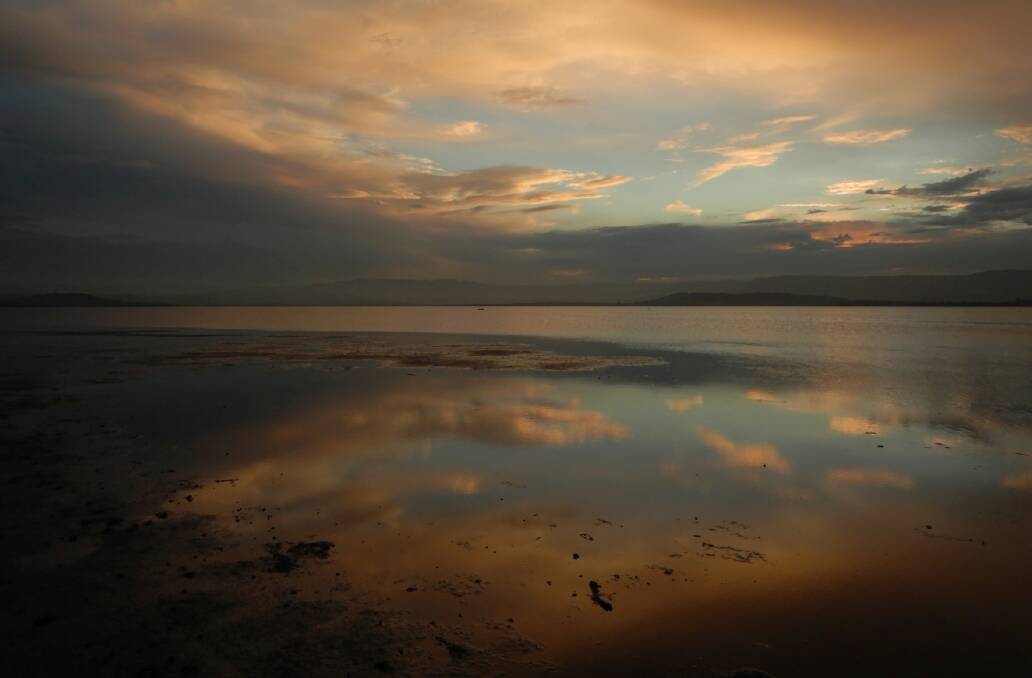 Lake Illawarra reflection taken at Primbee on October 9 by Hans Haverkamp