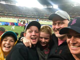 TOGETHER: Stu Taggart and his family together at the final of the 2020 ICC Women's T20 World Cup. 