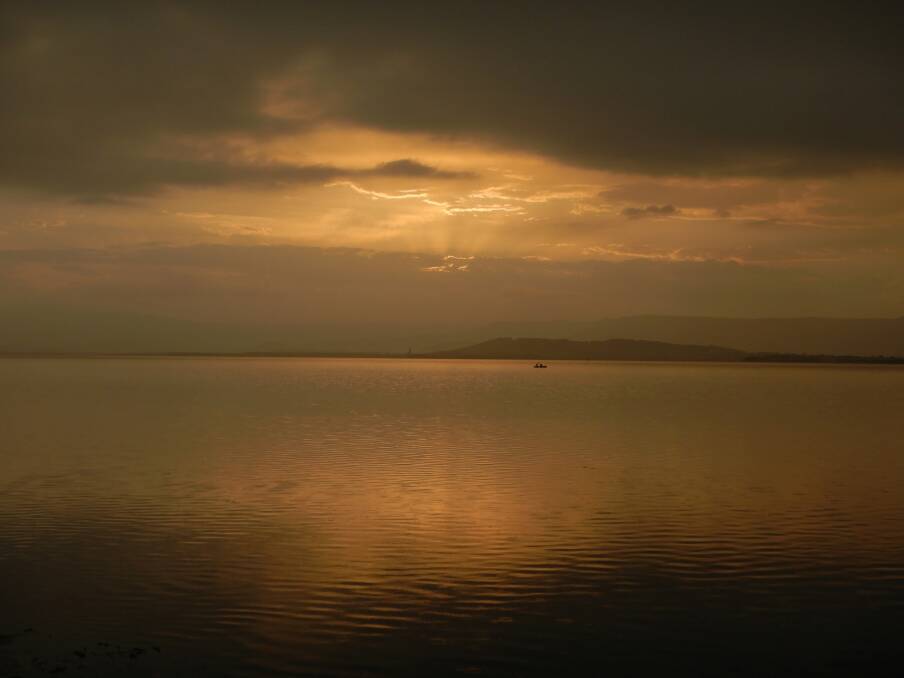 Lake Illawarra sunset after a storm taken at Mackie Park, Primbe  ,on January 27 by Hans Haverkamp. 