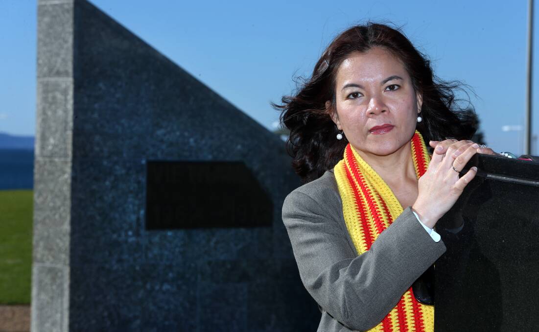 REMEMBER THEM: Teresa Tran at the Vietnam Veterans Memorial at Flagstaff Hill, where the ceremony will be held on Saturday.