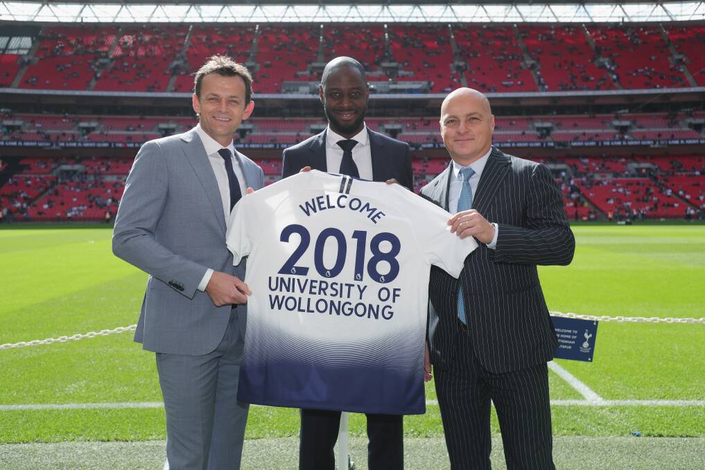 ON THE BALL: Professor Alex Frino (right) with UOW Brand Ambassador Adam Gilchrist (left) and Tottenham Ambassador Ledley King at Wembly Stadium in London before Saturday’s Spurs-Liverpool game.