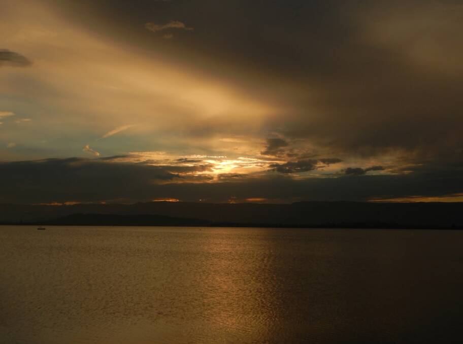 Lake Illawarra sunset taken at Primbee by Hans Haverkamp