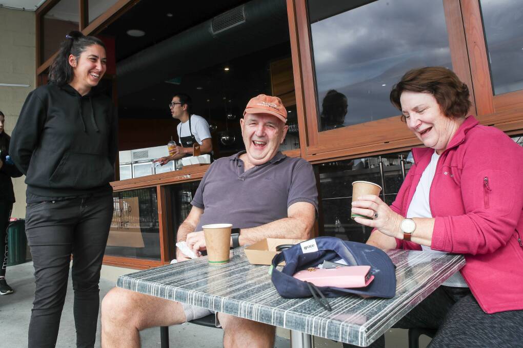 DINING: Bombora seafood owner Isis Junjor with Karen and Stephen Dawson after the NSW government lifted CODIV-19 gathering restrictions. Photo: Adam McLean.