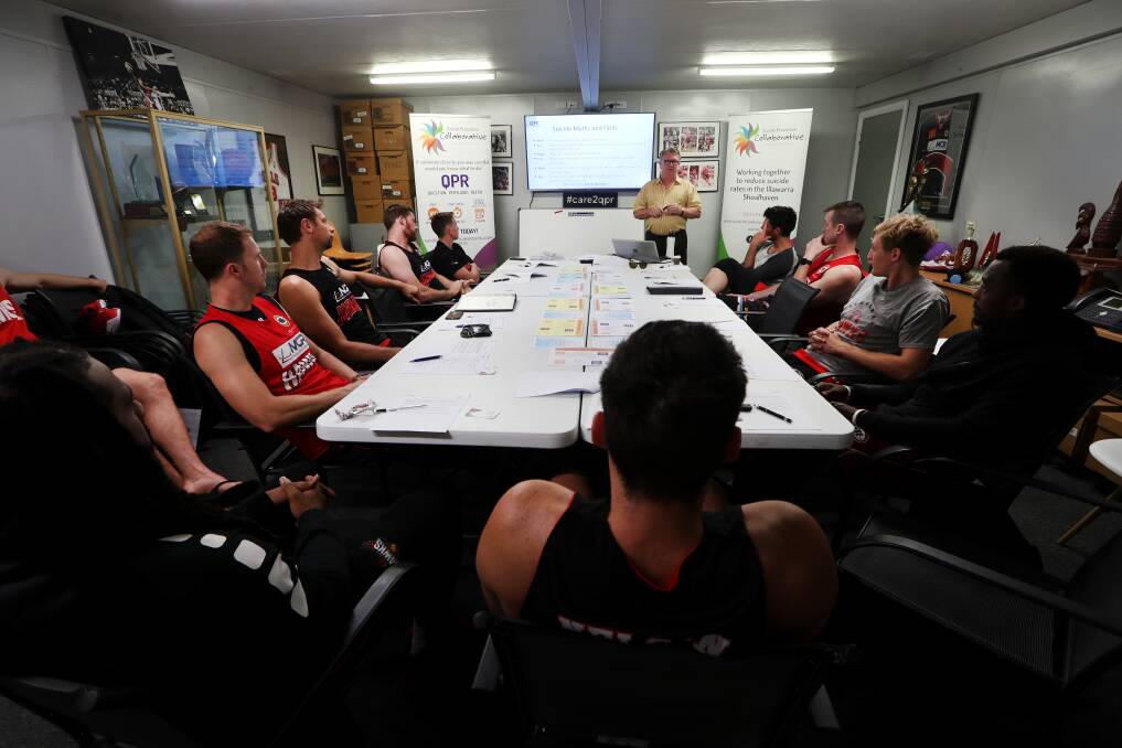 QPR ADVOCATES: The Illawarra Hawks playing group undertaking suicide prevention training as part of the #care2qpr campaign. Picture: Sylvia Liber.