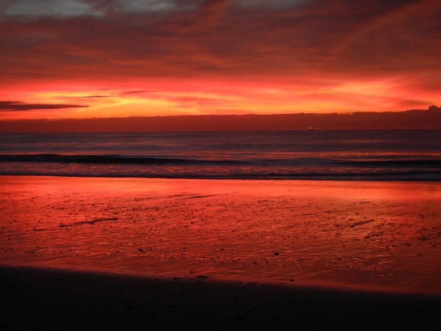 Red in the morning, taken at North Wollongong beach by Hans Haverkamp