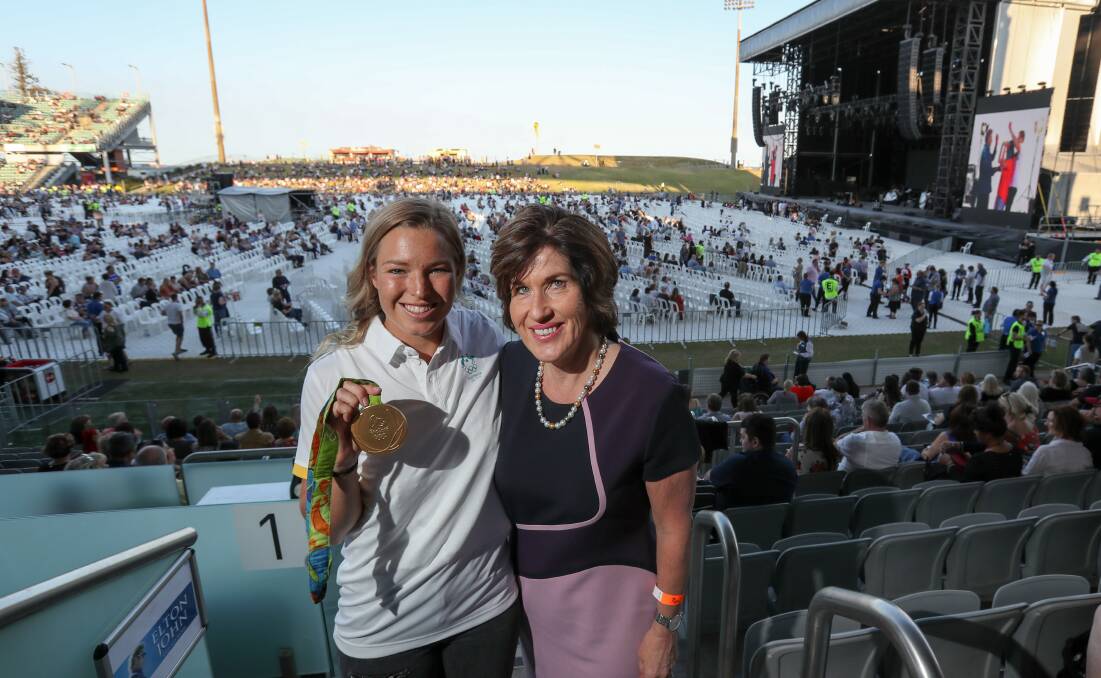 GOLD MEDAL PERFORMANCE: Venues NSW chair Christine McLoughlin (right) with Olympic rugby 7s gold medallist and Wollongong local Emma Tonegato. Picture: Adam McLean.  
