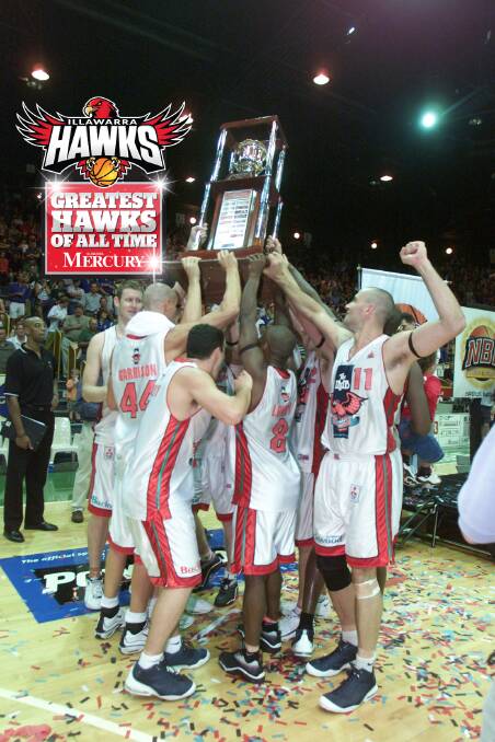 BUILDING THE FOUNDATIONS: The Hawks celebrating their 2001 championship. We will be asking for readers to help us chose the Greatest Hawks of All Time. 