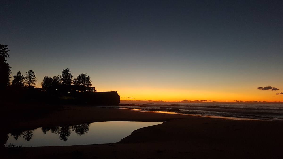 DAY'S END: An Austinmer sunrise by Dr Ron Witton. Send us your photos to letters@illawarramercury.com.au or post to our Facebook page.