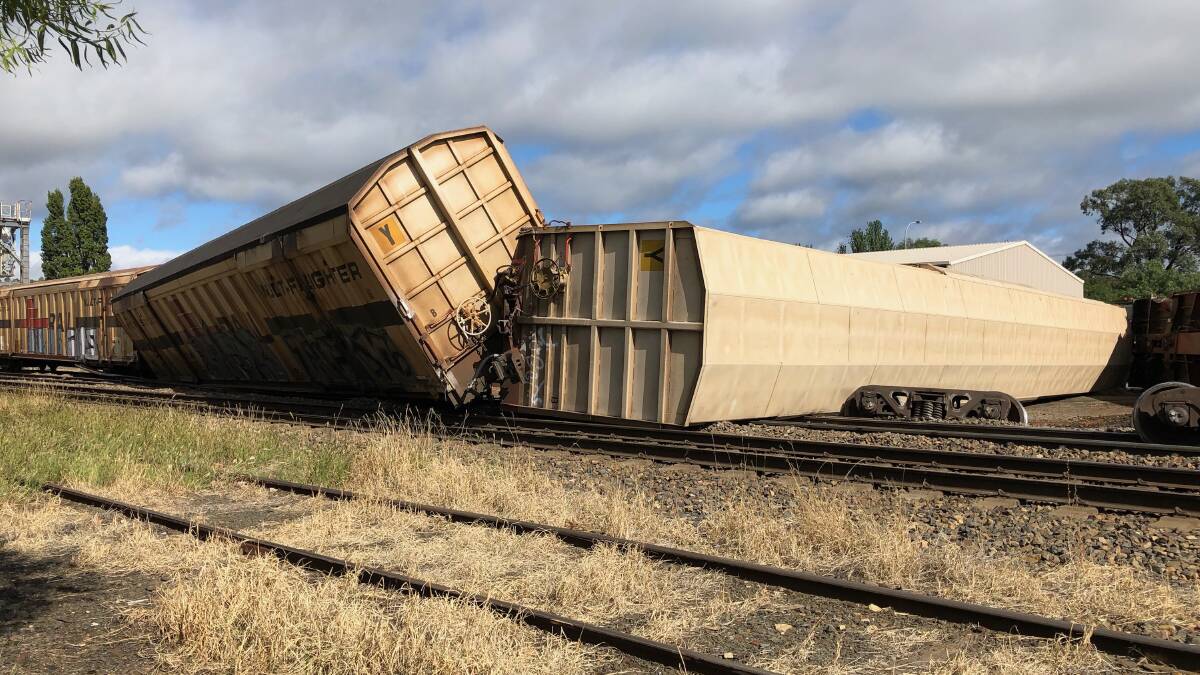 Some of the derailed covered wagons. Photo, Hannah Neale