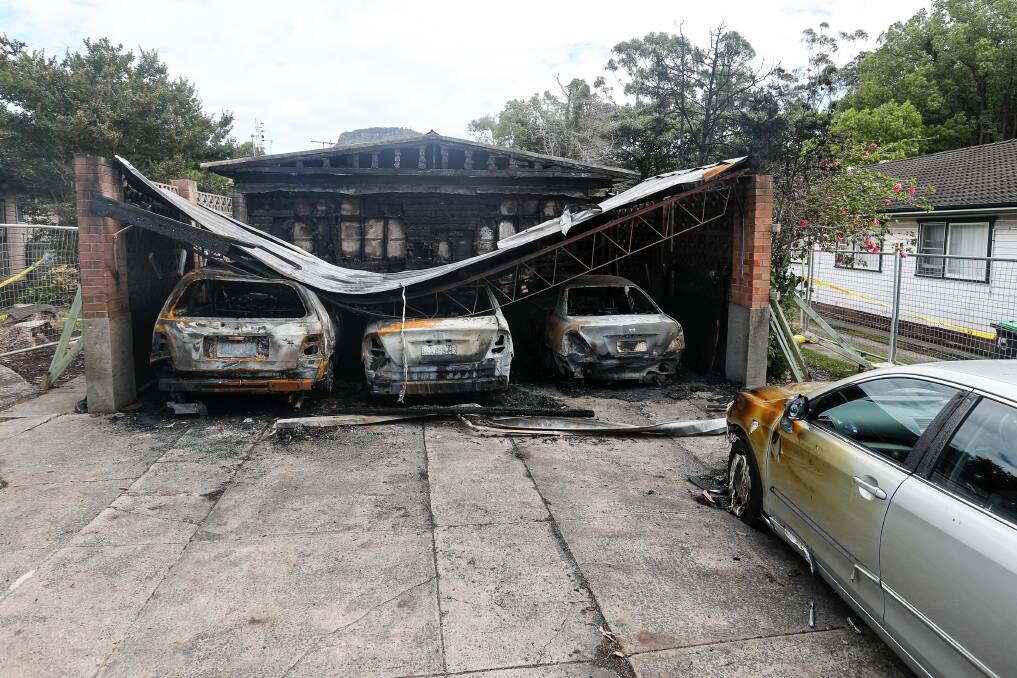 The fire burnt a wall adjoining Mrs Nguyen's unit, four cars and the carport during the early hours of Monday. Picture: Adam McLean