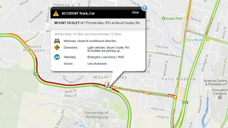 Truck, car crash on M1 at Mount Ousley