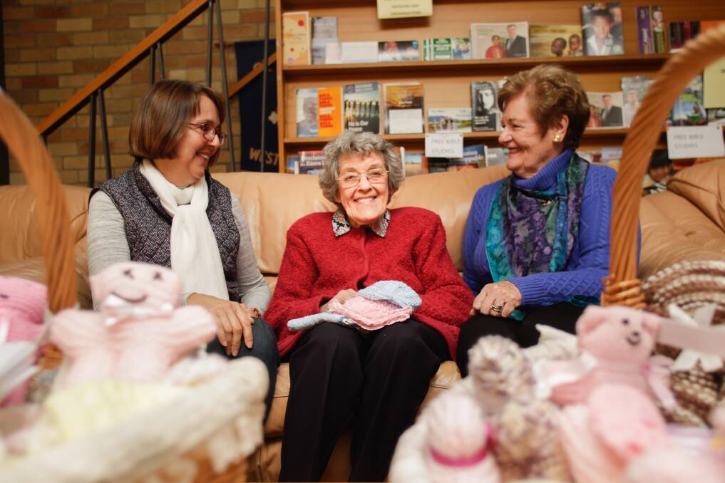Anna Hutchinson (left) and Janette Thomas celebrate 91-year-old Alice Isedale's (centre) community service spanning more than 60 years. Picture: Georgia Matts 