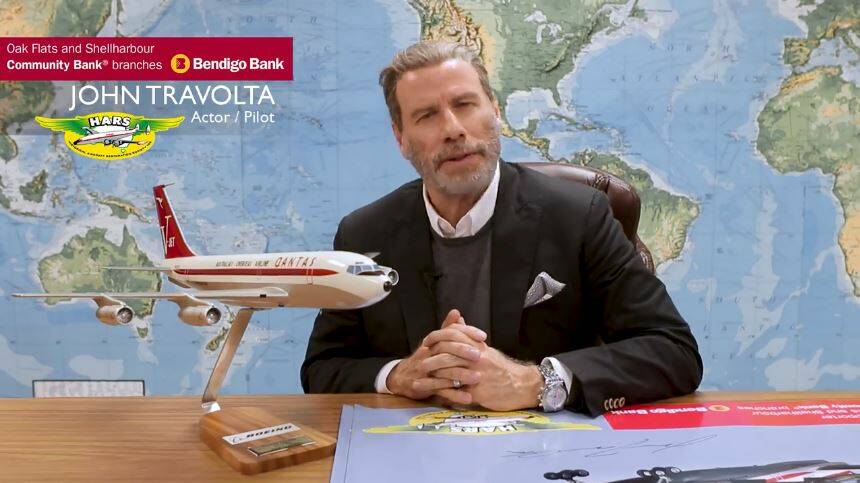Hollywood star John Travolta in the video. Travolta's standing in front of the Boeing 707 he's donating to the Historical Aircraft Restoration Society at Albion Park Rail. 