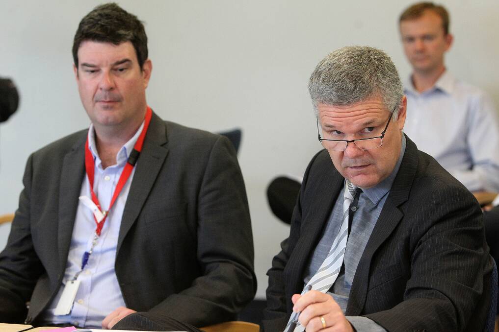 Wollongong City Council general manager David Farmer (right) with then-Director of Corporate and Community Services Greg Doyle in 2015. Mr Doyle has been appointed as the council's acting general manager ahead of Mr Farmer's departure this week. Picture: Greg Totman
