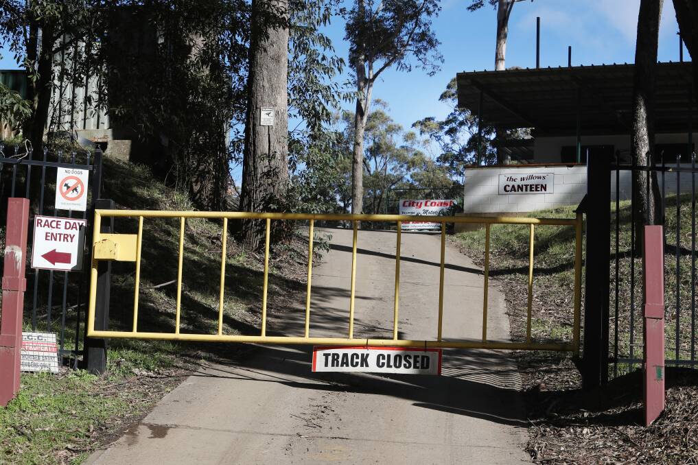 Visitors to the Wollongong Motorcycle Club's Mount Kembla dirt bike complex were met with locked gates and "track closed" signage after a man died in a crash on Sunday morning. Police are investigating the accident. Picture: Robert Peet